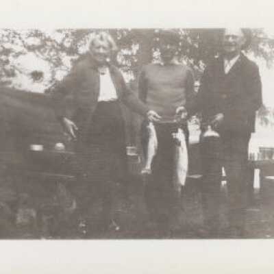 Unknown Persons - Holding Fish