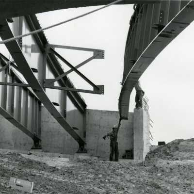 Construction Worker with Steel Girlder, I-205 Bridge Construction.