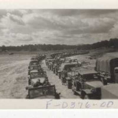 Army Trucks and Jeeps in Long Rows - No Date