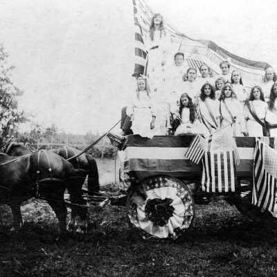 Milwaukie, Oregon Fourth of July, 1907 - Horse and Wagon with Riders and Flags.