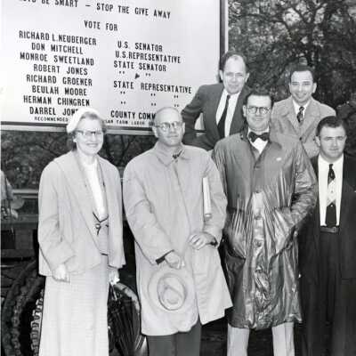 U.S.Senator Maurine Neuberger and Politicians with Politcal Sign.: Copyright: None; Origsize: 8" x 10"; Origformat: Print-Photographic