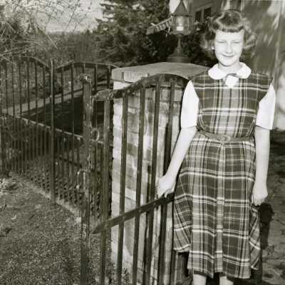 Girl standing at Iron Gate