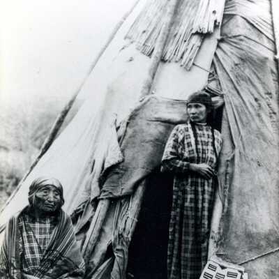 Two Native American Women in front of Tipi
