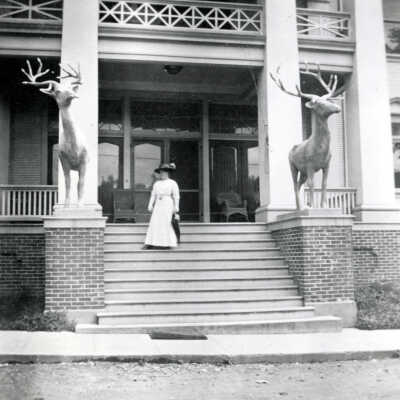 Woman on Steps of Old Elks Building, 610 Water Street, Oregon City. 1913.: Copyright: None; Origsize: 5" x 5"; Origformat: Print-Photographic