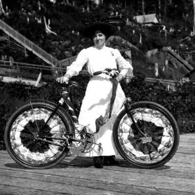 Fourth of July Parade, 1903.  Miss. Lizzie Parkratz with Bicycle.: Copyright: Clackamas County Historical Society; Origsize: 5x7; Origformat: Print-Photographic