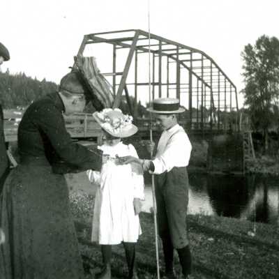 Fishing by the Wagon Bridge across Clackamas River at Park Place
