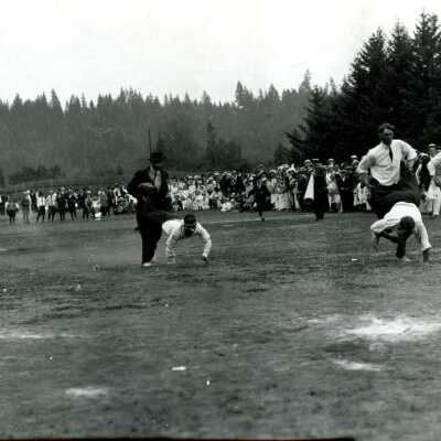 Men's Wheel Barrow Race, Gladstone 4th of July Celebration.