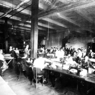 Sewing factory and workers in Woolen Mill.
