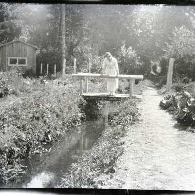Unidentified Woman on Bridge.