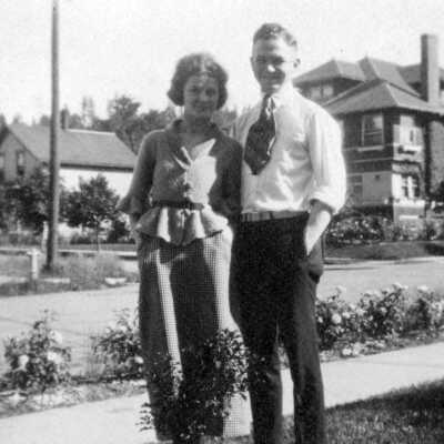D) Couple in front of John Surfus' home, O.C.: Copyright: None; Origsize: 2" x 3"; Origformat: Print-Photographic