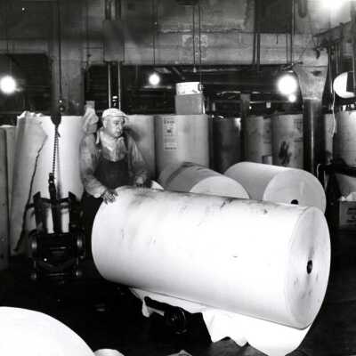 Newspaper Printshop and Rolls of Newsprint