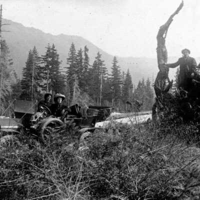 Family in car on toll road and at Rhododendron Tavern, 1911.: Copyright: Clackamas County Historical Society; Origsize: 5x7; Origformat: Print-Photographic