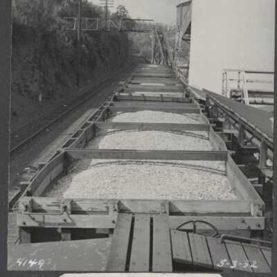 Lumber Industry - Chip railroad cars at factory. 05-03-1952