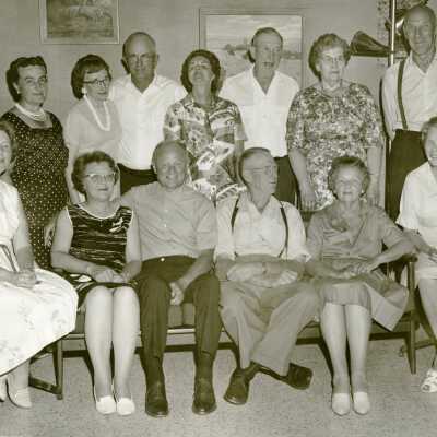 Group Photo of 5 Men and 8 Women.