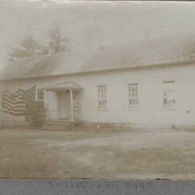 Unknown School Building with US flag