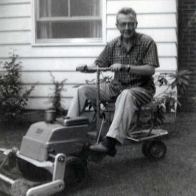Joe Miller on Riding Lawn Mower, 1961.: Copyright: None; Origsize: 3" x 5"; Origformat: Print-Photographic