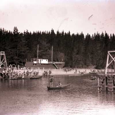 Boy Scout Lake Chamberlain and beach at Camp Merriwether with ship and Boy Scouts