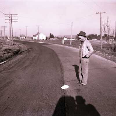 Man standing in street for Pacific Indemnity - December 1941