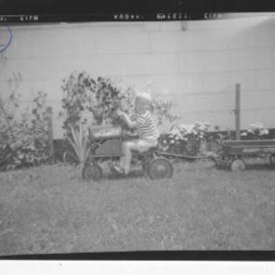 Boy with Toy Tractor and Wagon