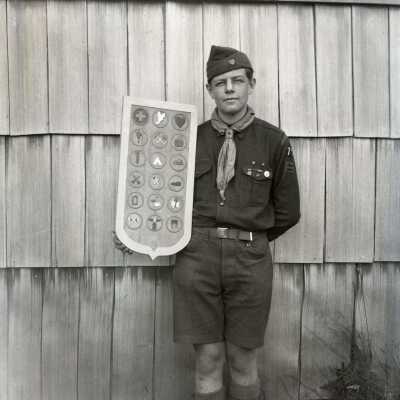Boy Scout Owen Mathews with woodcarving - Negative