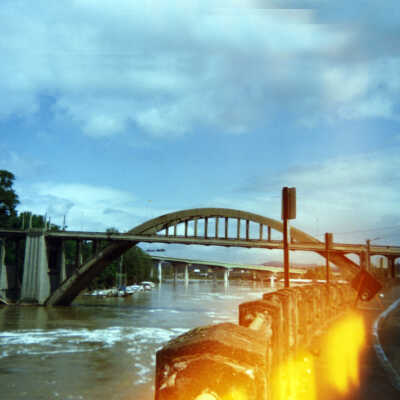 West Linn-Oregon City Arch Bridge, viewed from Highway 99E, 1990s.: Copyright: None; Origsize: 5" x 7"; Origformat: Print-Photographic