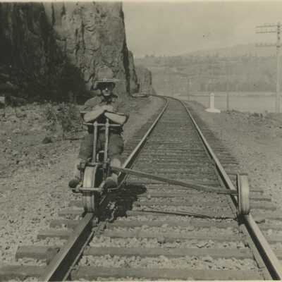 Man on railroad speeder