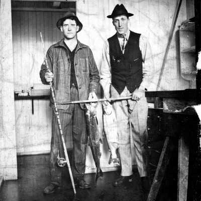 William Laidlaw & friend with fish in Oregon City, 1914.