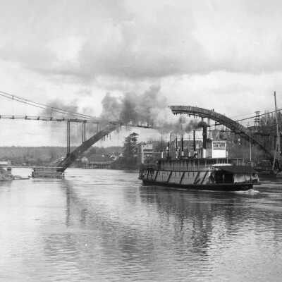 Steamship "Claire" Passing Under Construction of Oregon City Arch Bridge.