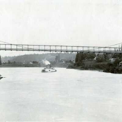 Oregon City/West Linn Suspension Bridge. The Courthouse is located on right.: Origsize: 3" x 5"; Origformat: Print-Photographic