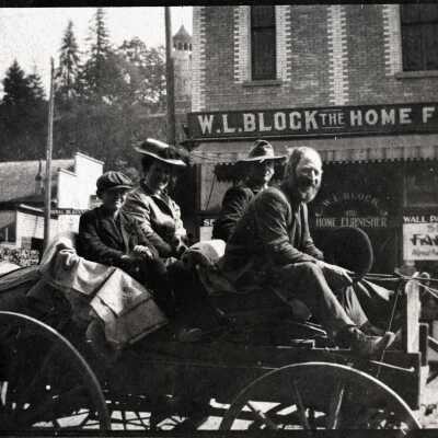 Family in Carriage, 7th and Main Streets, Oregon City.