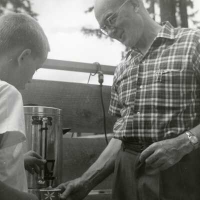 Boy Serving Man Coffee.
