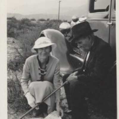 Man and Woman by a Car
