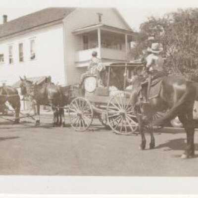 Stagecoach, mules, Large Building