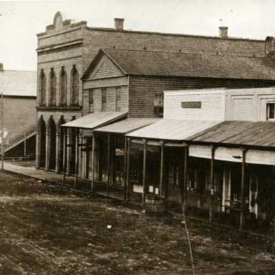 The Pope building and Stores with Wooden Awnings. 1880: Copyright: None; Origsize: 6" x 8"; Origformat: Print-Photographic