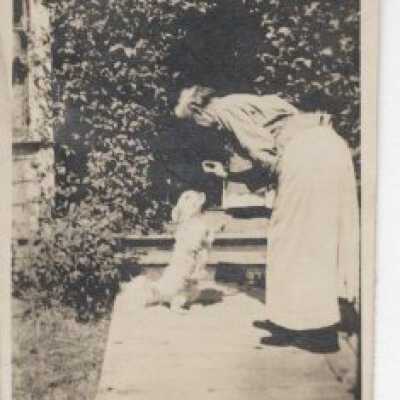 Unknown Persons - Little Dog and a Woman