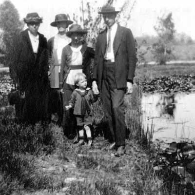 Miss Bedwell, Miss Kupp and the Neilsen Family.