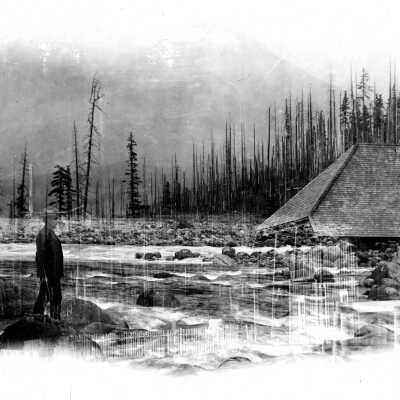Mt. Hood and a river and man walking