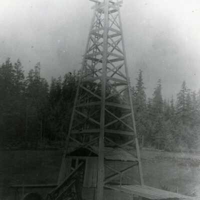 Stone Home Oil and Gas Derrick. 1915: Copyright: None; Origsize: 8" x 10"; Origformat: Print-Photographic