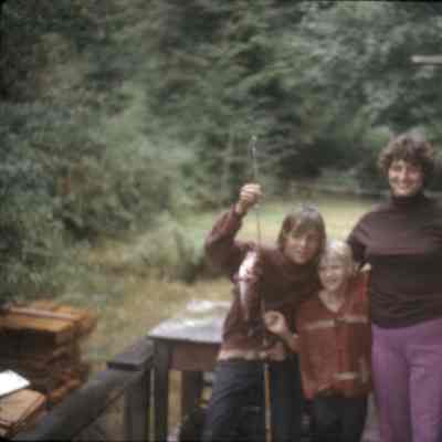 2540 - family at cottage with fish.tif
