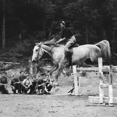 4884 - Woman jumping boys looking on.tif