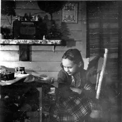 3705 - Girl in kitchen, cat, radio 1947-52.tif