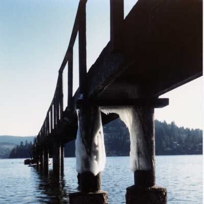 Jan storm aftermath, ice on wharf, 1989