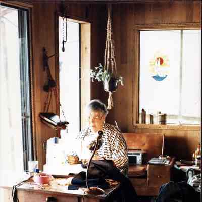 3779 - Helga at sewing machine.tif