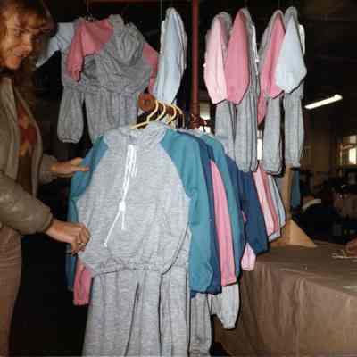 3780 - Helga selling her kids' track suits.tif