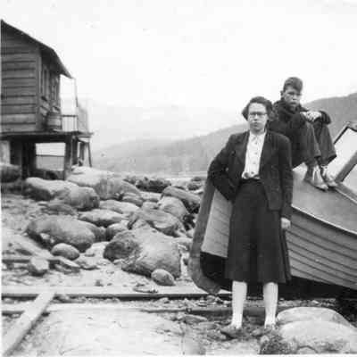 3715 - Woman and boy by boat.tif