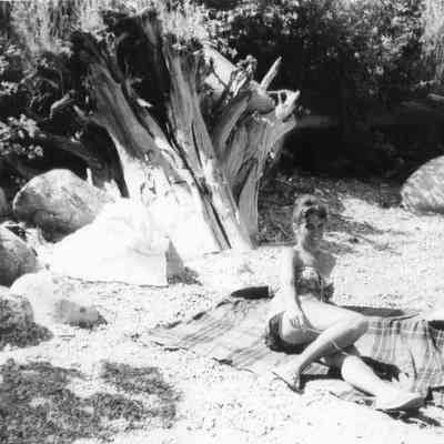 3742 - Joyce Oostwouder sunning on beac 1958c.tif