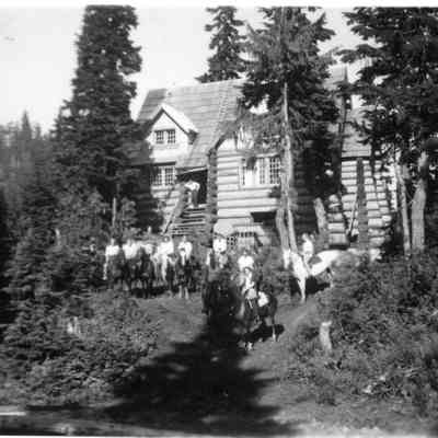 4853 - Eleven Horse riders in front of lodge on Mt Seymour 1946-08-24.tif