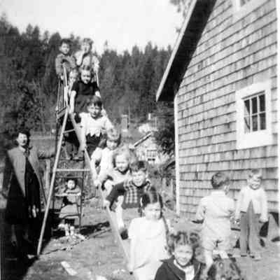 3834 - Kids on slide c1949.tif