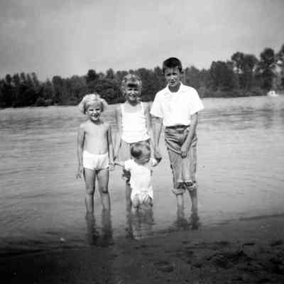 3326 - Moss children standing in water.tif