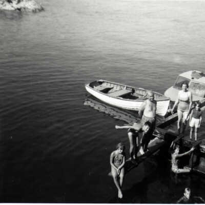 Playing on wharf, Aug 1958